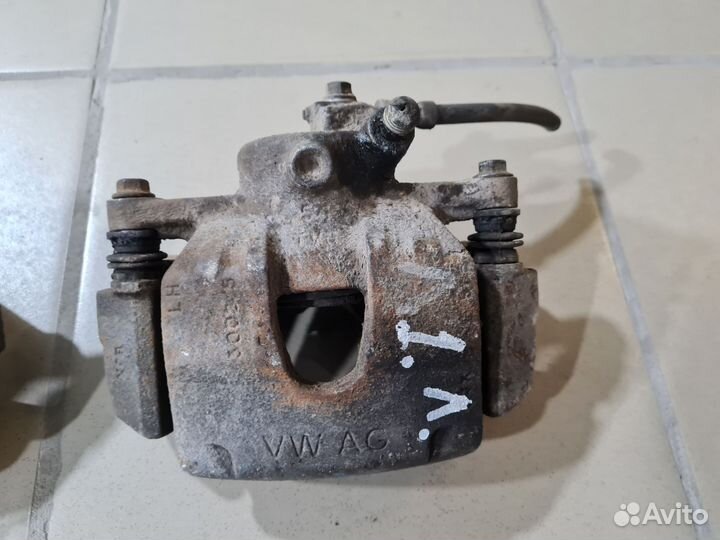 Суппорт передний Volkswagen Polo 5