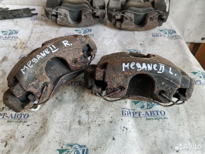 Суппорт тормозной передний Renault Megane II реста