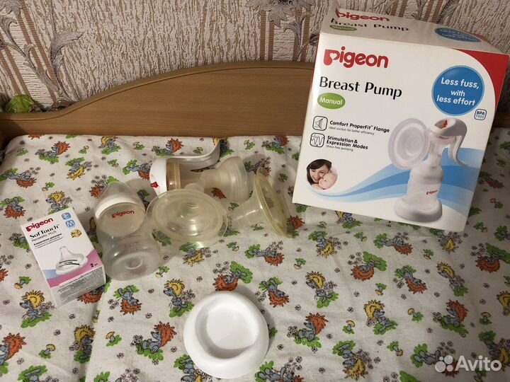 Молокоотсос ручной (+ 4 пакета для молока)