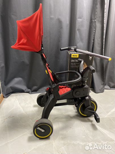 Детский велосипед с ручкой doona красный