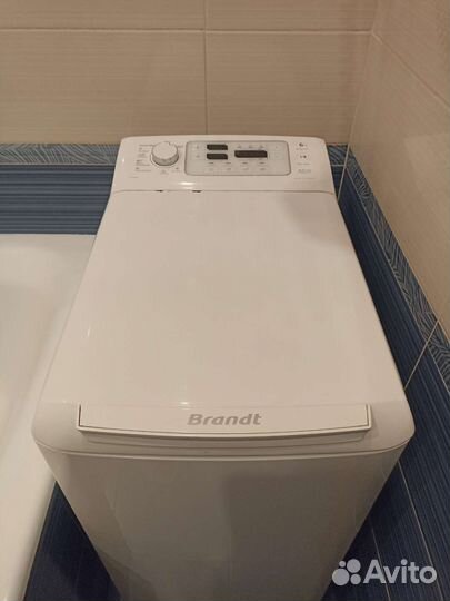 Стиральная машина Brandt с вертикальной загрузкой