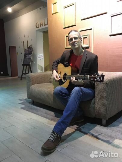 Преподаватель по гитаре