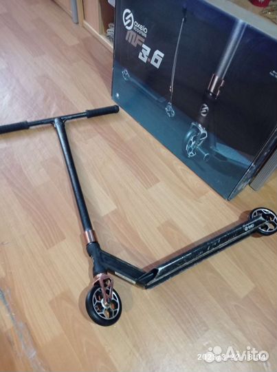 Трюковой самокат oxelo