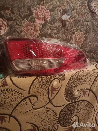 Зданий правый фонарь Киа Рио 2011