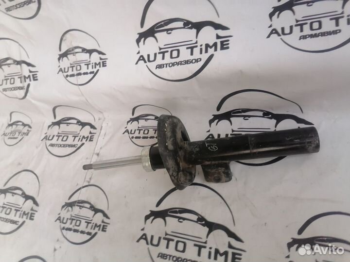 Стойка амортизатора передняя правая opel astra j