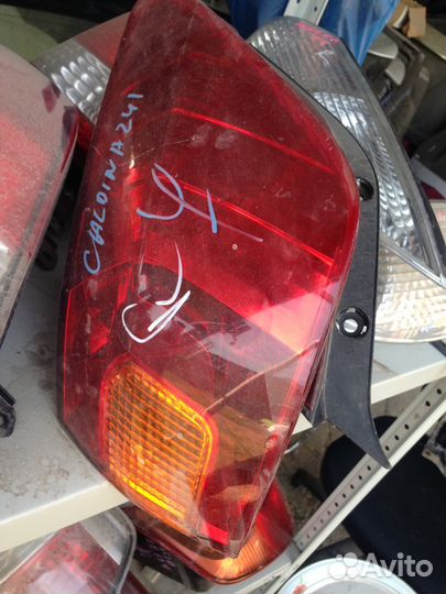 Toyota Caldina 241 левый фонарь