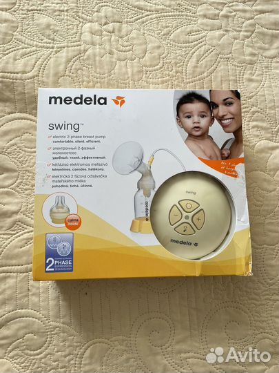 Молокоотсос medela swing электрический
