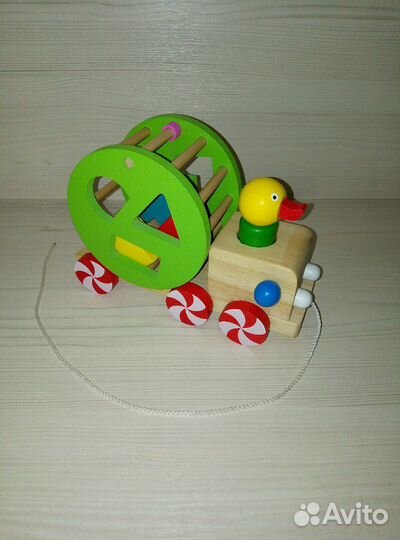 Развивающая игрушка-каталка сортер Утёнок