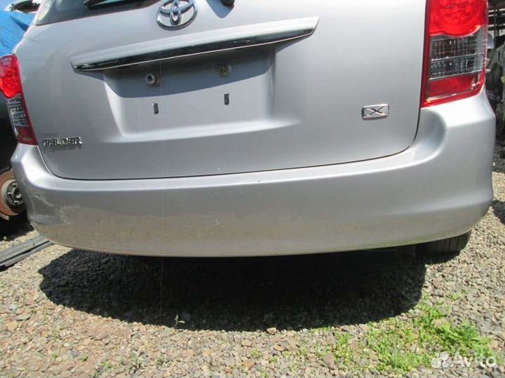 Бампер задний Toyota Corolla Fielder NZE141 1NZ-FE