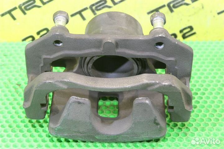 Суппорт тормозной передний левый Suzuki Grand