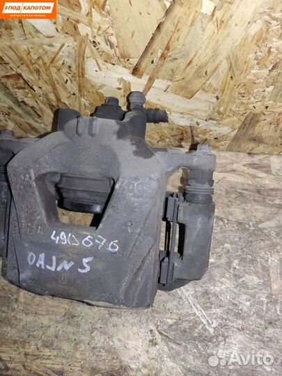 Суппорт тормозной передний левый Opel Astra J