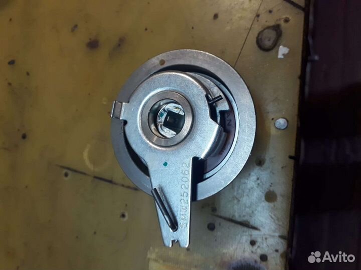 Натяжной ролик