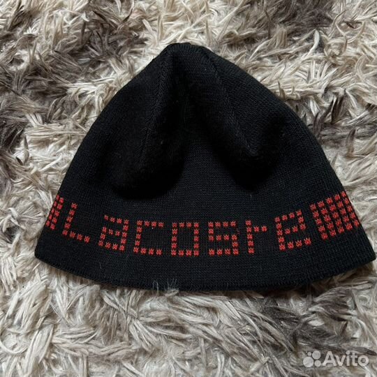 Двухсторонняя шапка Lacoste