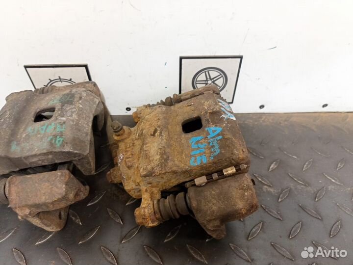 Суппорт тормозной передний для Nissan Almera N15