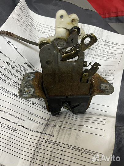 Замок крышки багажника Митцубиси Ланцер 9