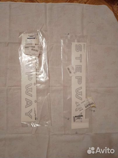 Эмблемы, наклейки