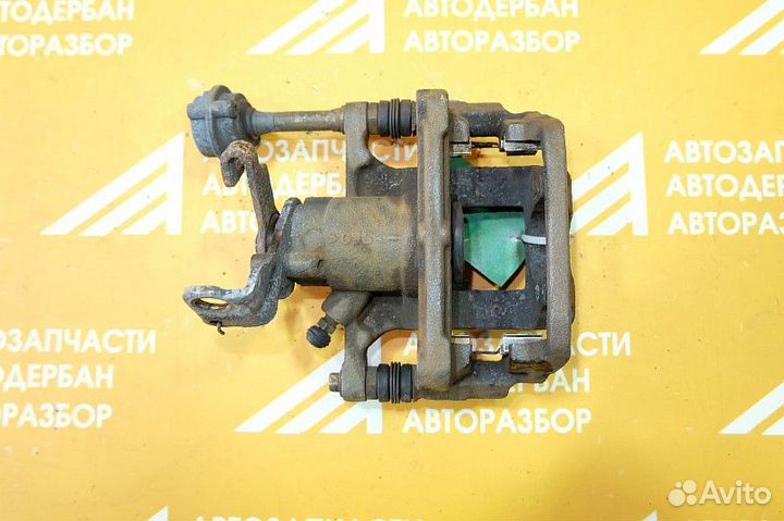 Суппорт тормозной задний правый Opel Astra J