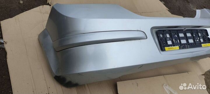 Бампер задний Opel Astra H / (хейчбек)