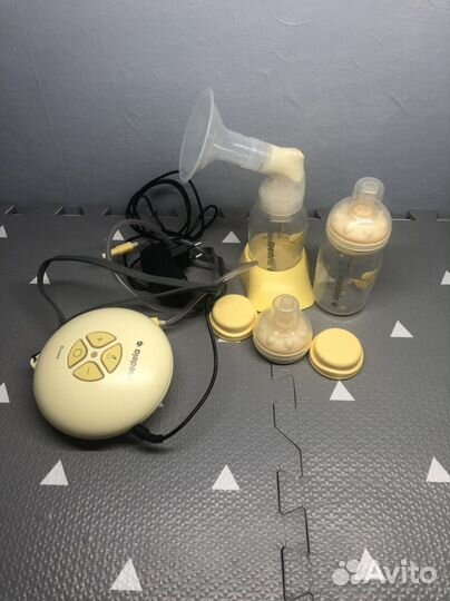 Молокоотсос medela электрический