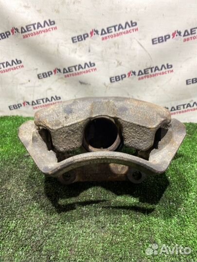 Суппорт тормозной передний правый Volkswagen