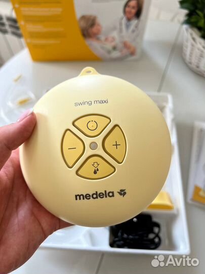Молокоотсос medela swing maxi flex