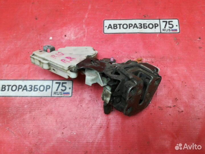 Замок двери задний правый Nissan Presea R10 GA15DE