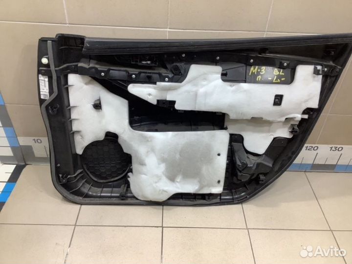 Обшивка двери передней левой передняя левая Mazda