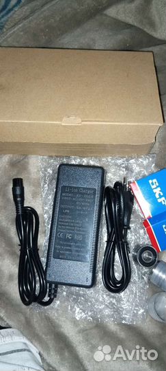 Зарядное устройство 54.6v 2A на kugoо М4