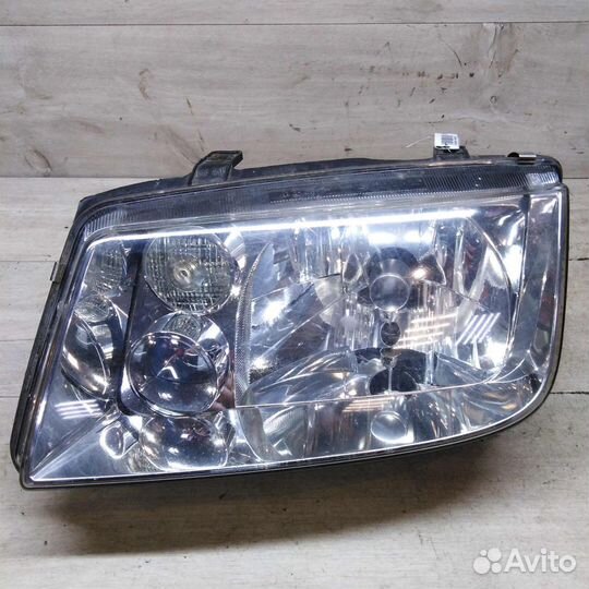 Фара левая Volkswagen Bora