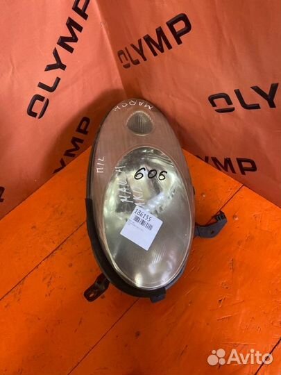 Фара левая Nissan March AK12 CR12