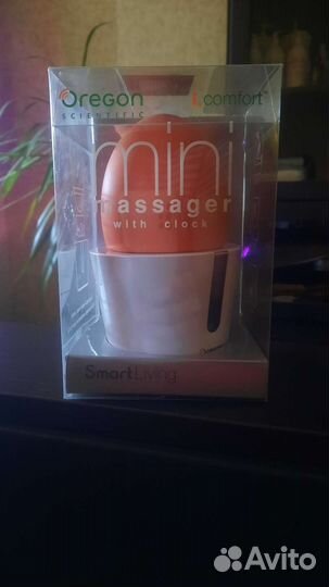 Мини массажер Oregon scientific с часами