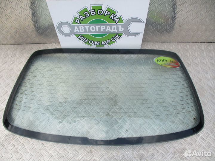 Стекло заднее Kia Spectra