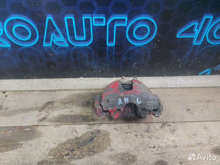 Суппорт левый Astra H