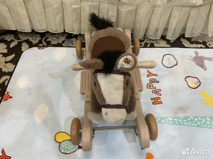 Детская каталка лошадь