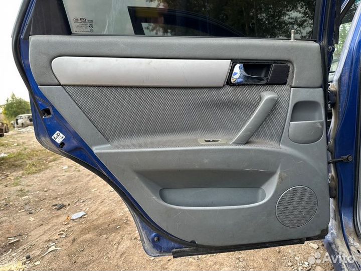 Обшивка двери Chevrolet Lacetti седан 1.4 F14D3
