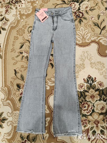 Джинсы клеш женские