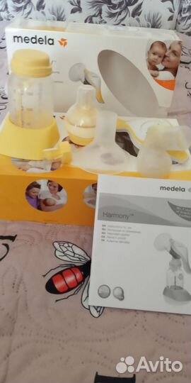 Молокоотсос medela ручной