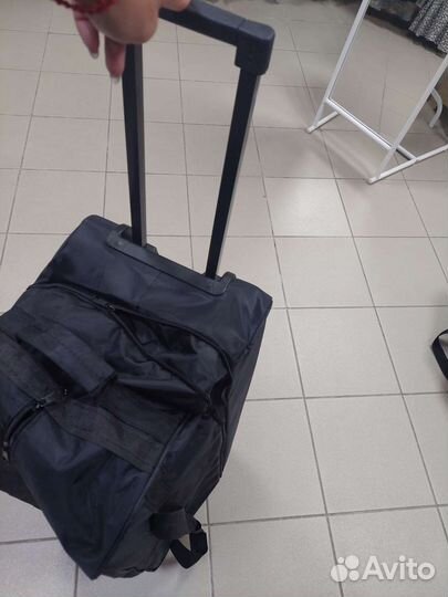 Сумка дорожная на колесах с выдвижной ручкой