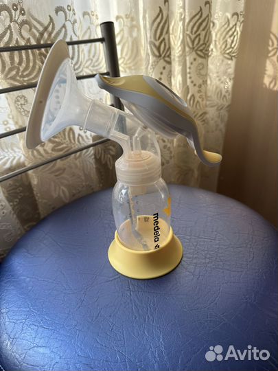 Молокоотсос medela ручной