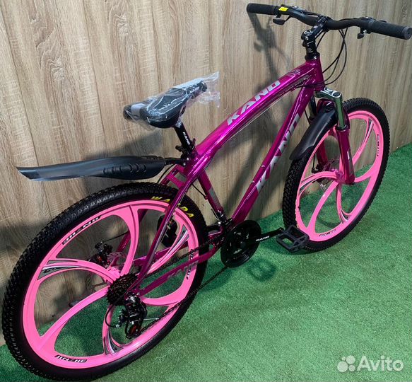 Велосипед розовый а литых дисках
