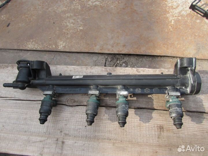 06A133317A Распределитель топлива (рампа)