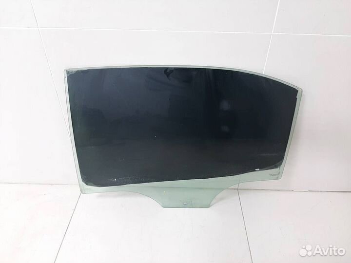 Стекло двери задней левой Skoda Rapid 2012-2020