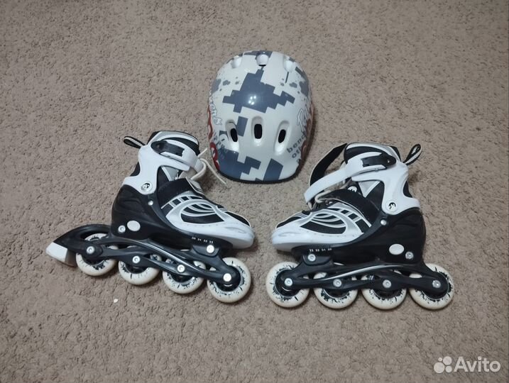 Роликовые коньки