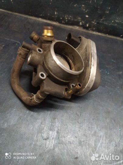 Дросельная заслонка 