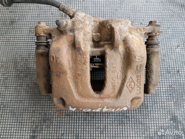 Суппорт тормозной передний Опель Виваро 01-14