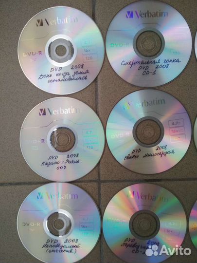 CD с фильмами и дискеты пакетом
