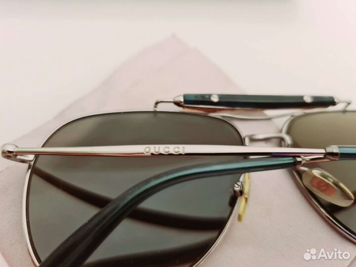 Солнцезащитные очки Gucci