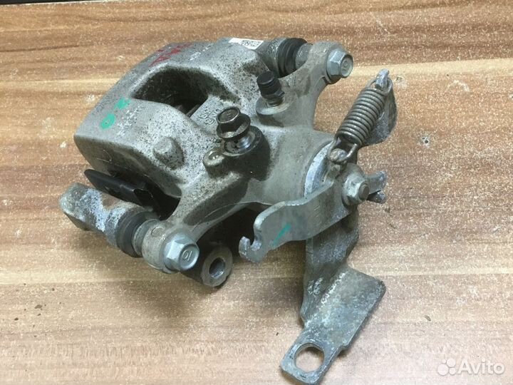 Суппорт задний левый Kia K5