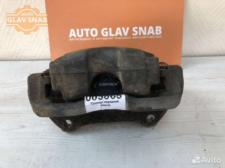 Суппорт передний левый Opel Astra J