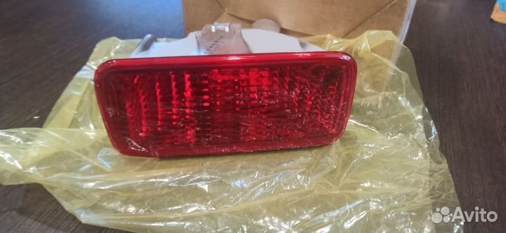 Фонарь противотуманный задний правый на Лансер 9